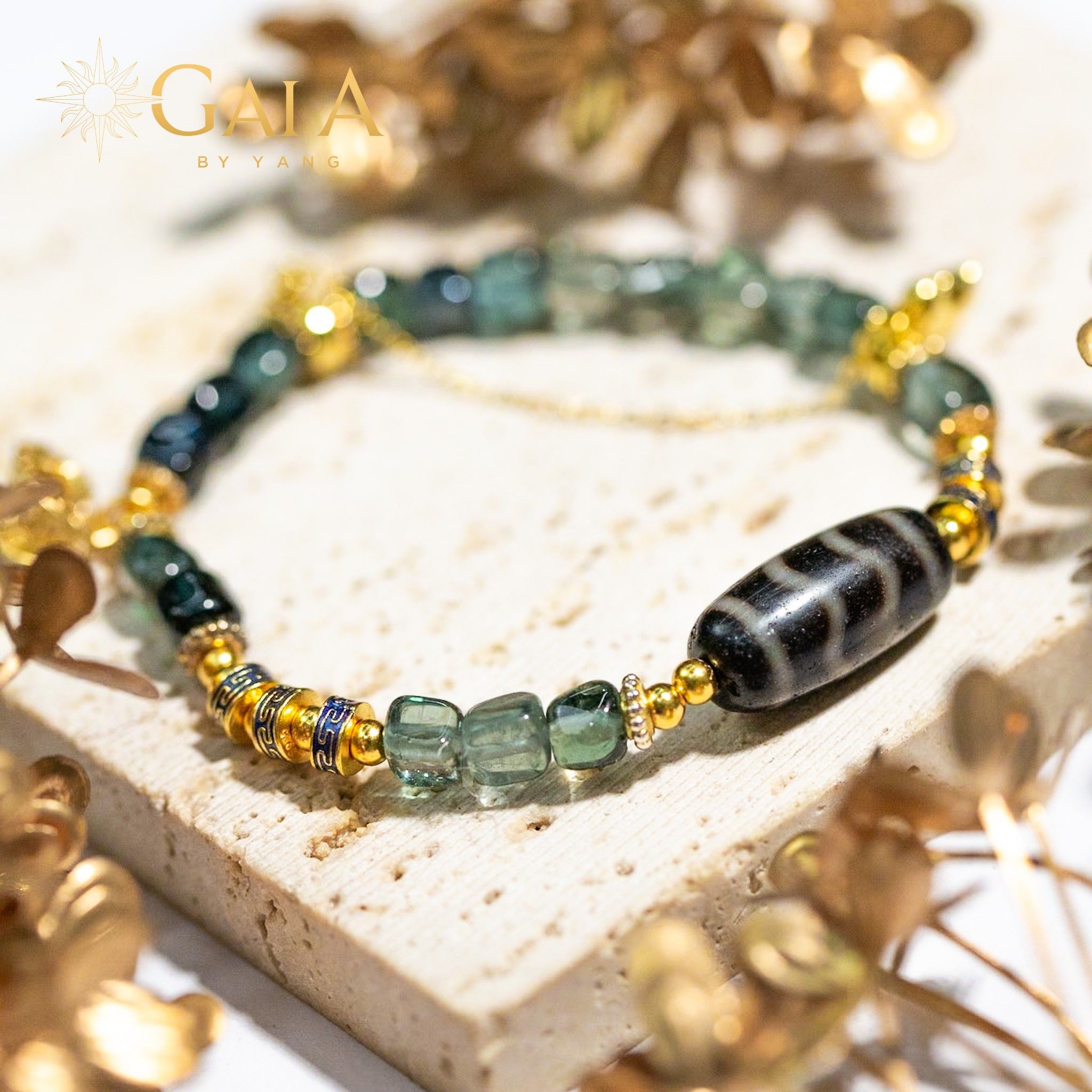 Vòng đá Tourmaline phối Dzi sóng nước