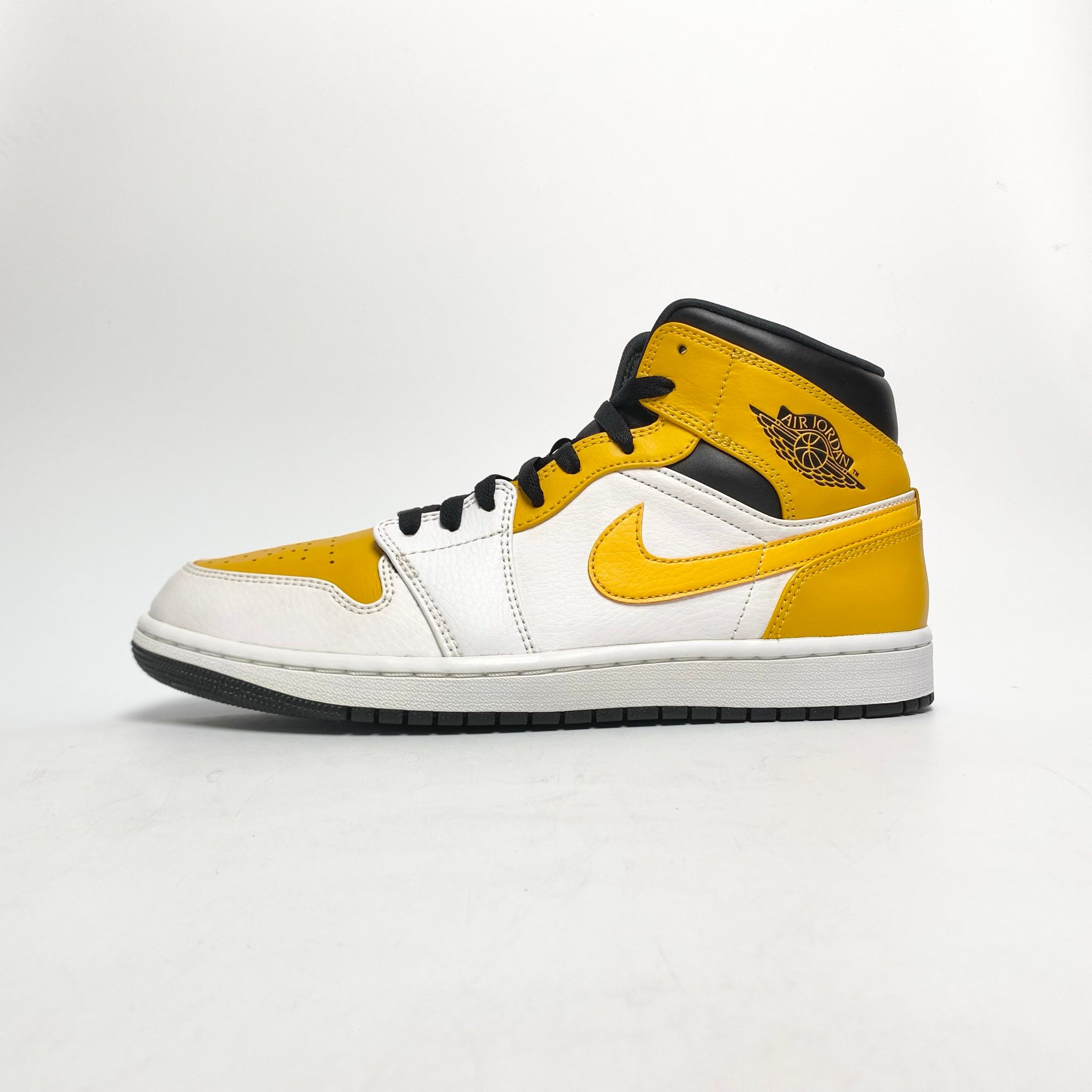 NIKE AIR JORDAN 1 MID UNIVERSITY GOLD 554724-170