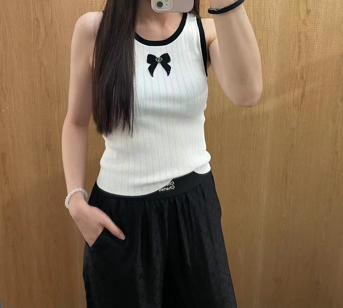 Áo 3 lỗ trắng viền đen - nơ xê quin