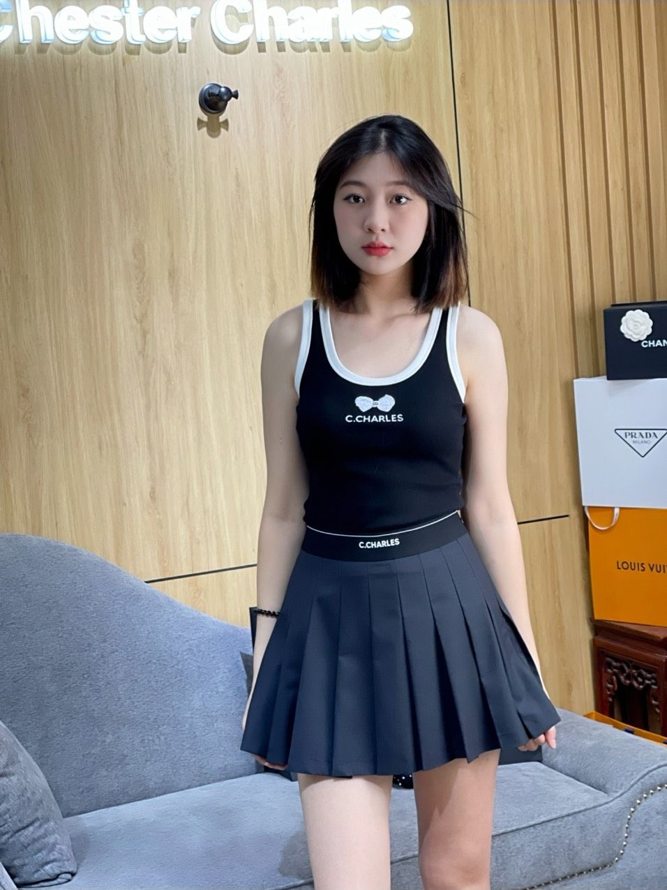 Tank top đen viền trắng - nơ ren