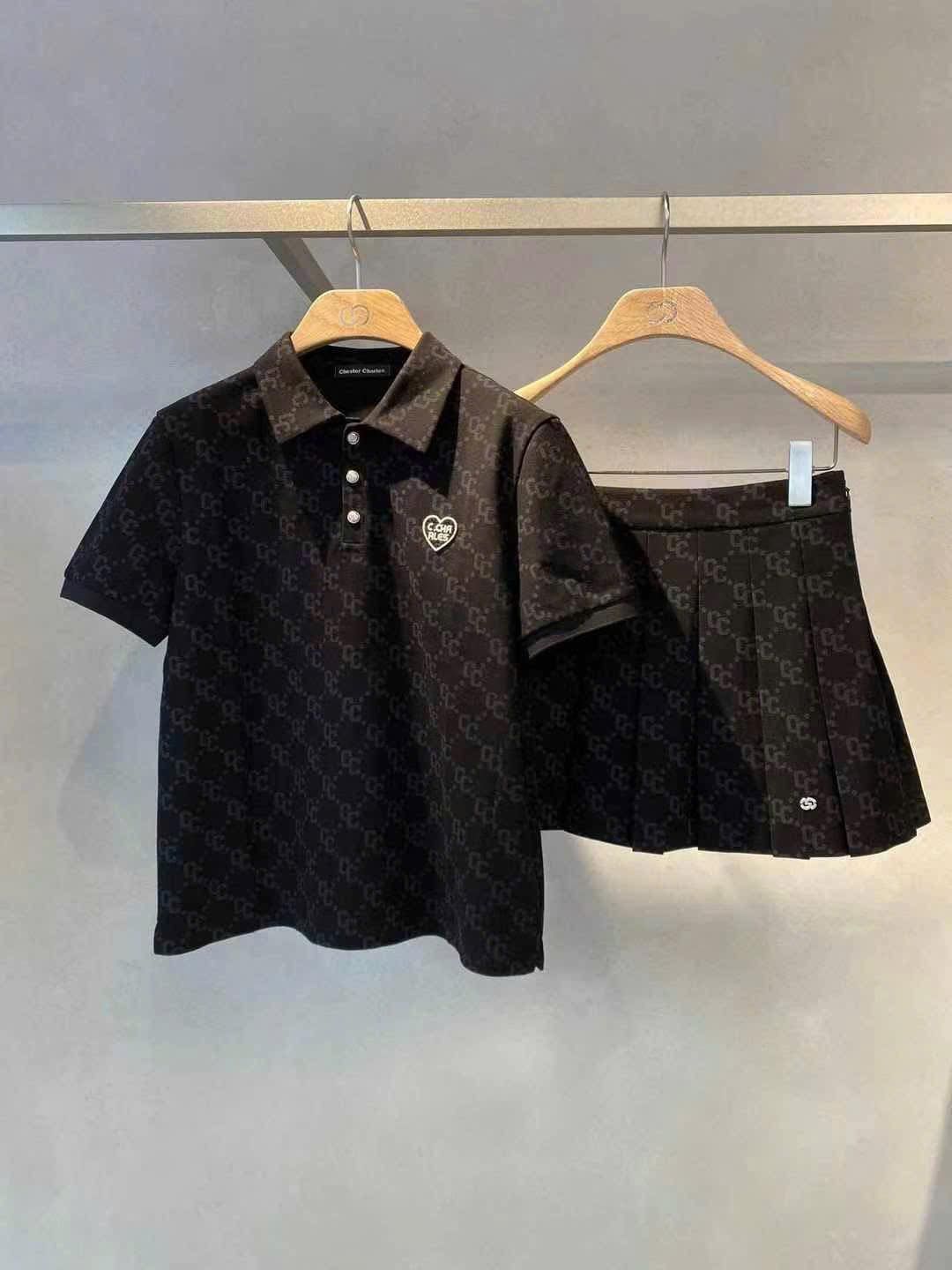Áo polo đen full logo tim trái