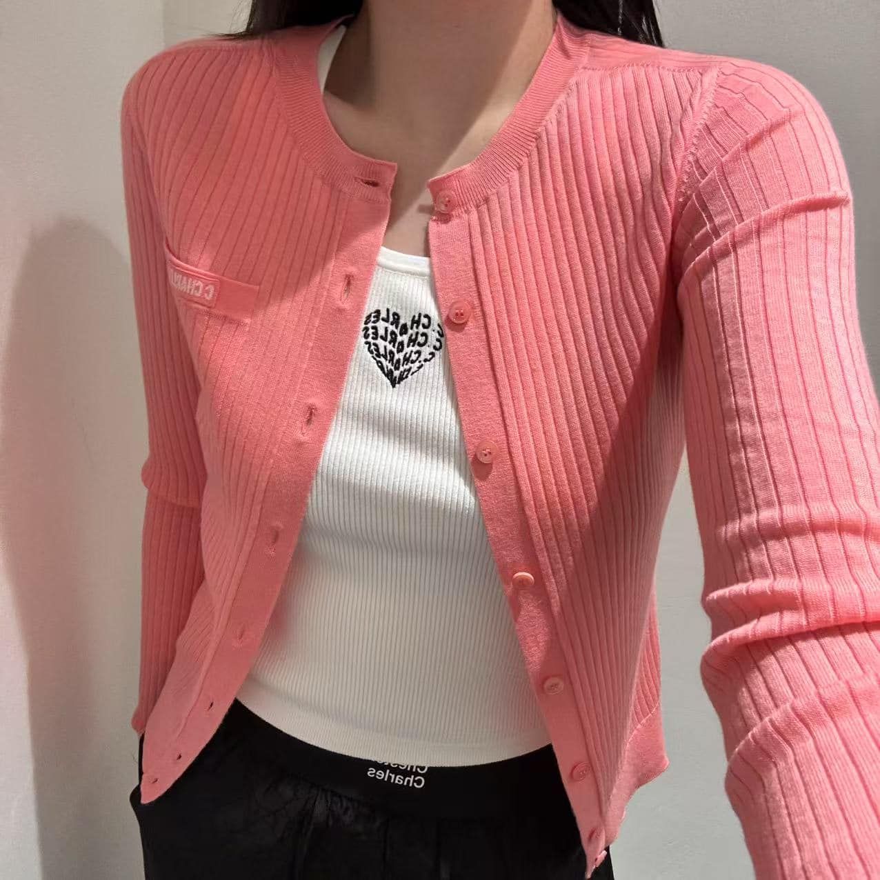 Áo CDG hồng đào - túi ngực chữ trắng