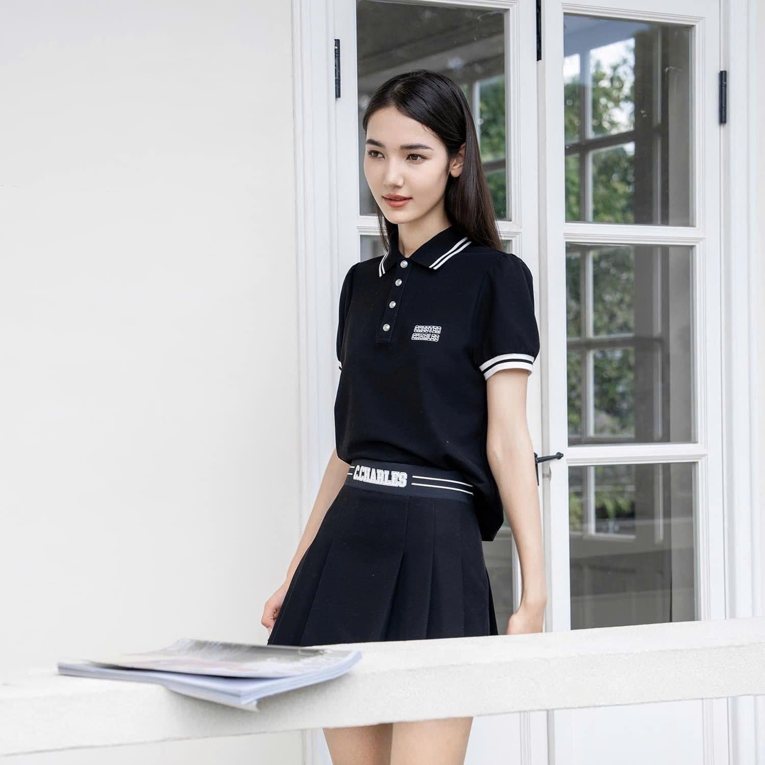 Bộ áo polo cổ viền trắng và chân váy cạp thun C.Charles set