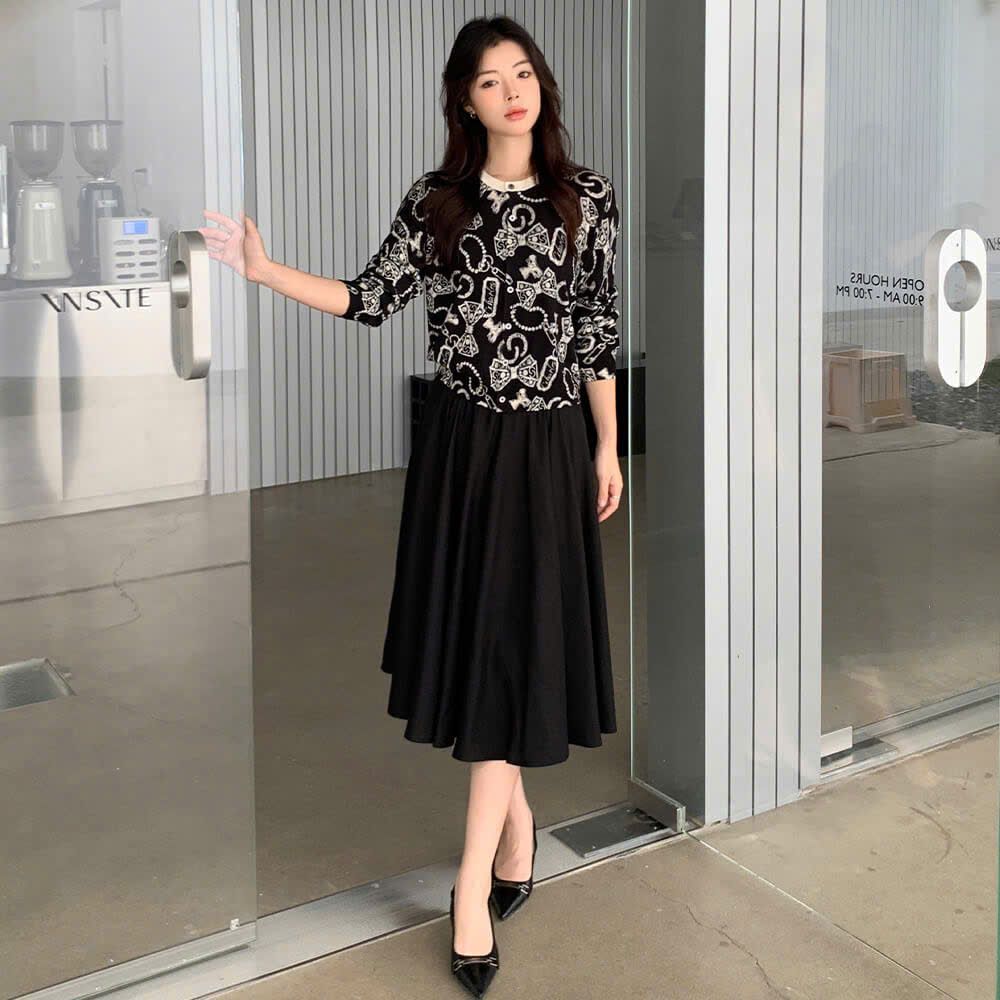 CDG đen họa tiết nơ tim