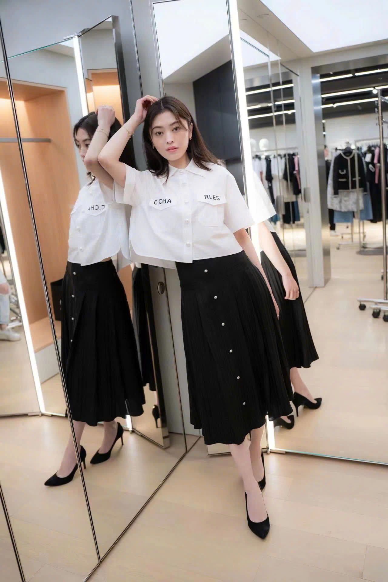 Chân váy lụa đen - cúc ngọc