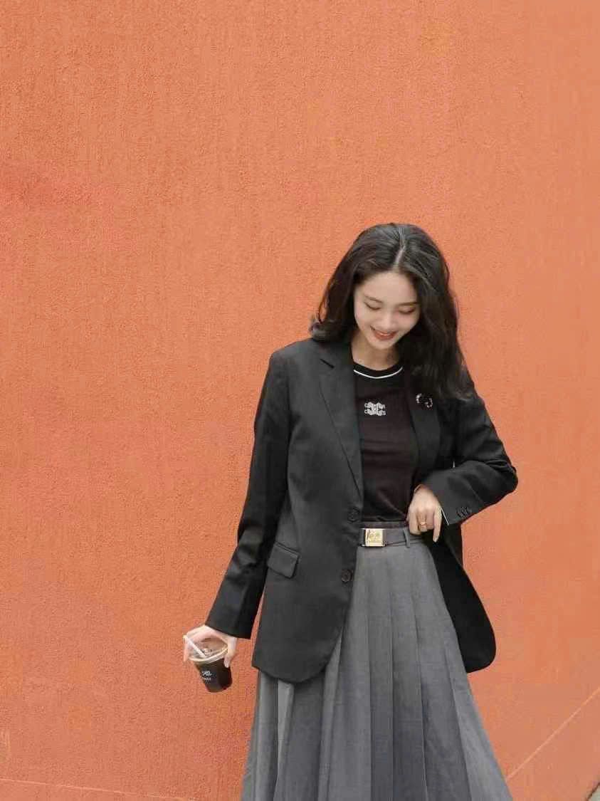 Áo Blazer viền cổ CC, tay lật
