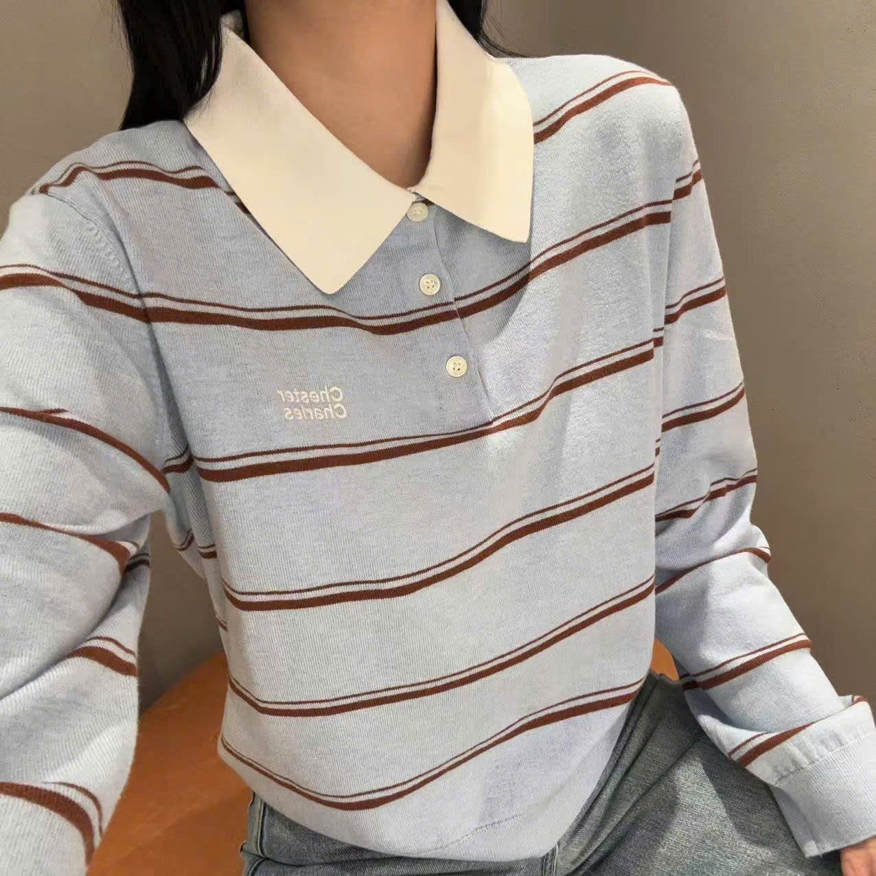 Áo Polo dài tay xanh cổ trắng , viền đỏ