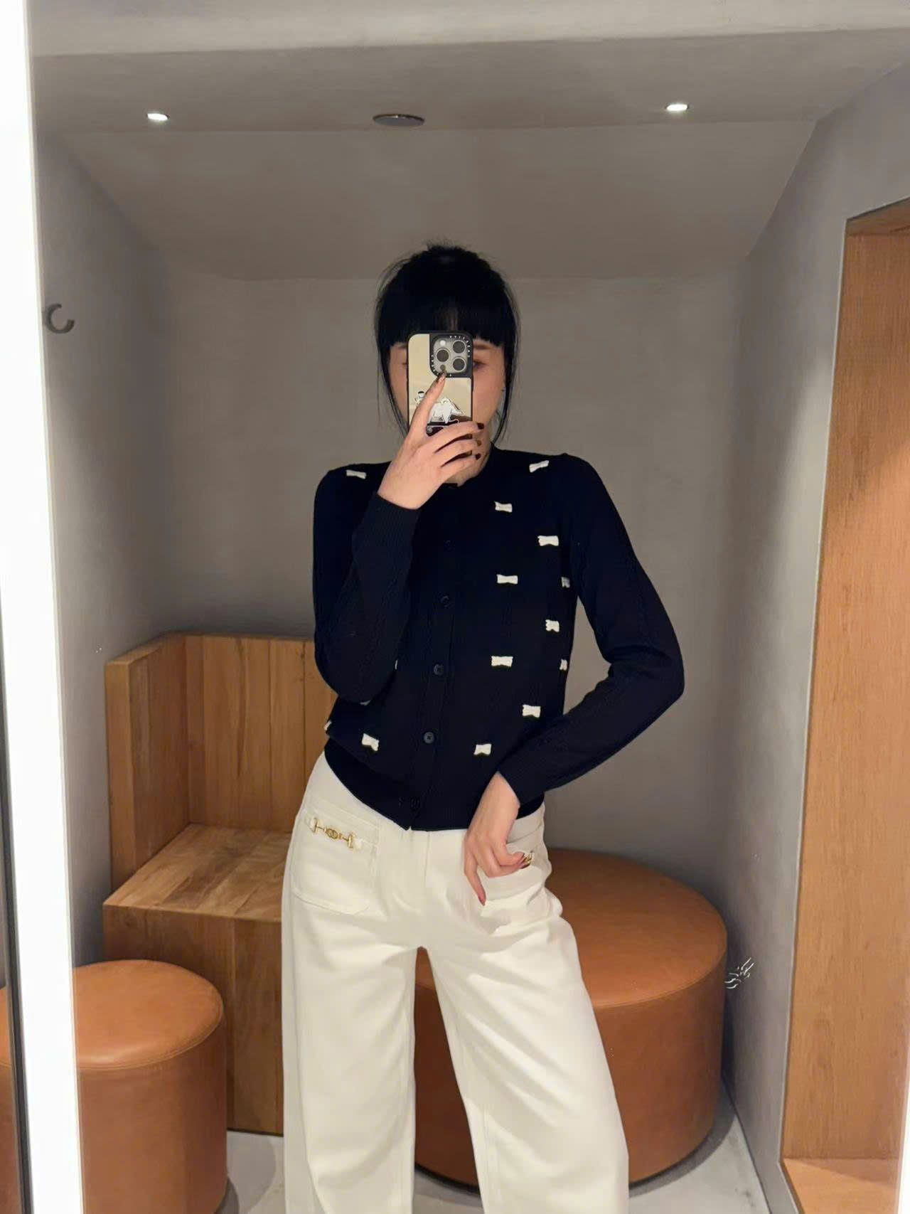 CDG đen nơ trắng