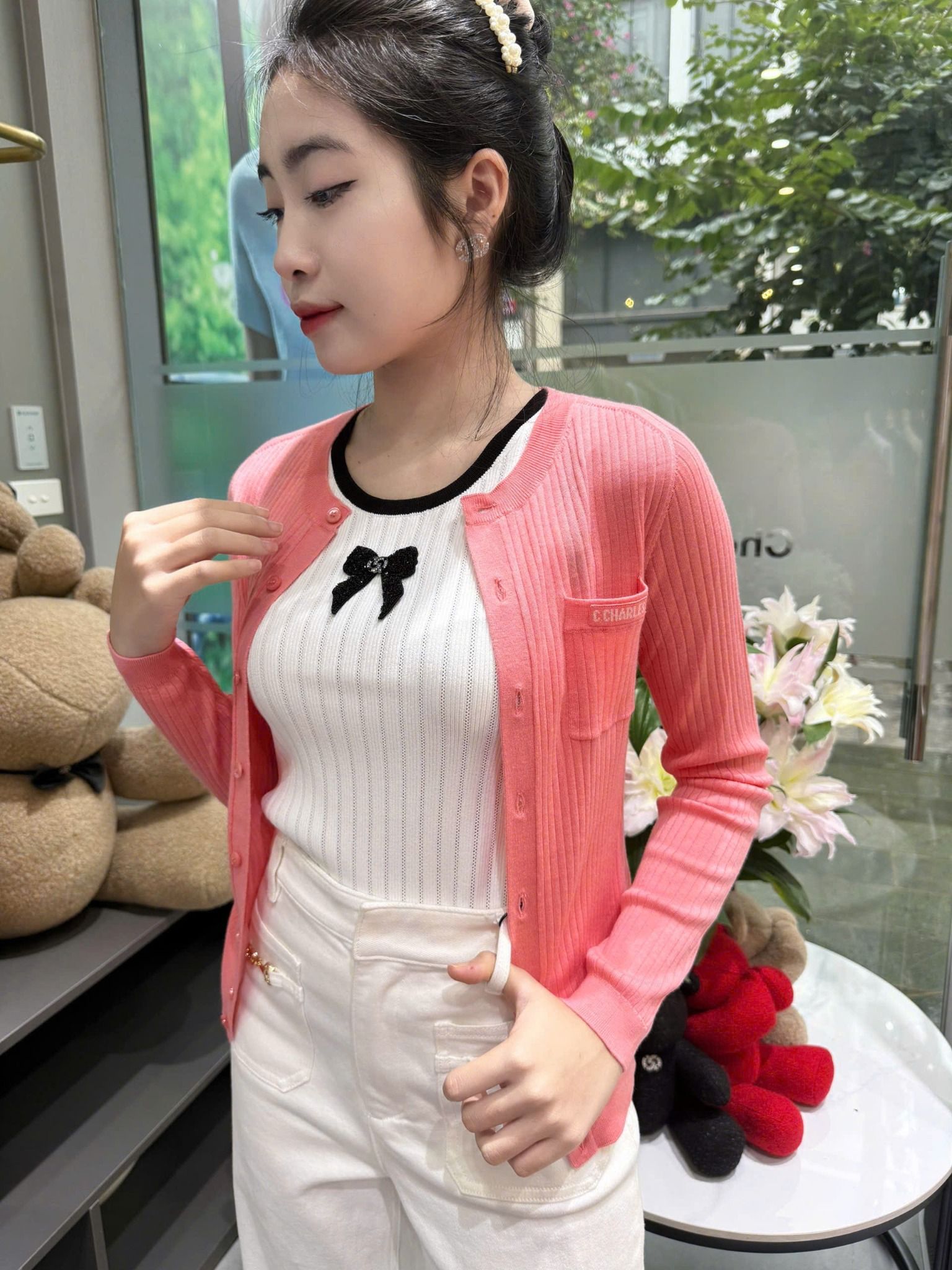 Áo CDG hồng đào - túi ngực chữ trắng