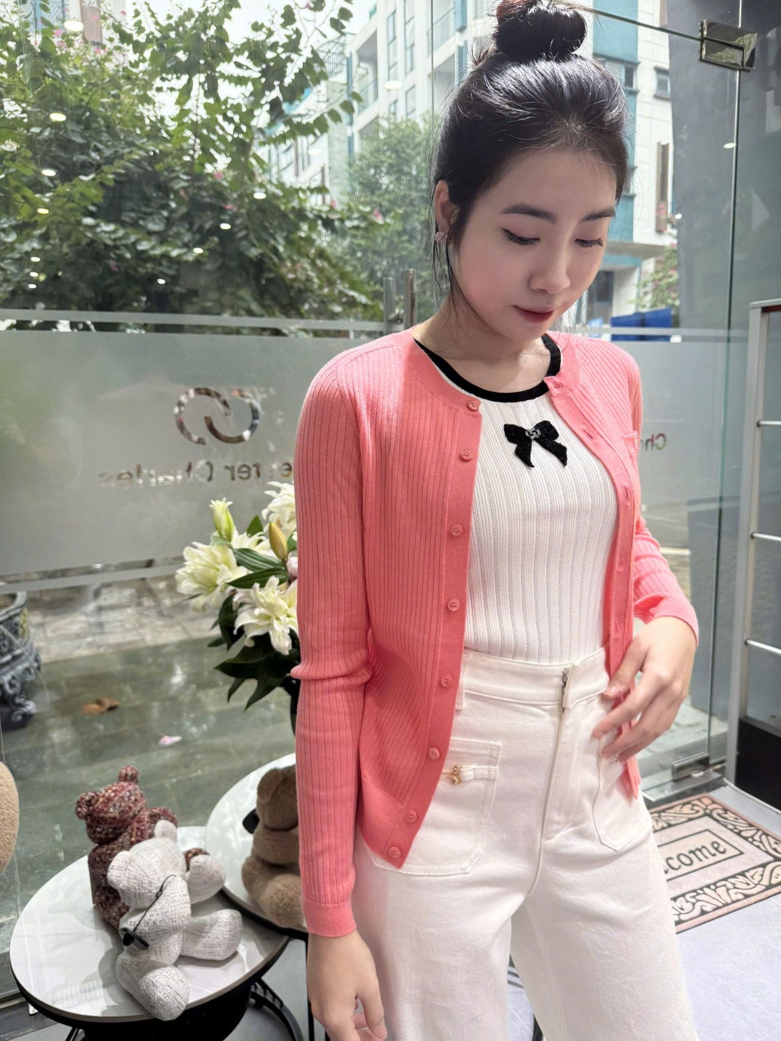 Áo CDG hồng đào - túi ngực chữ trắng