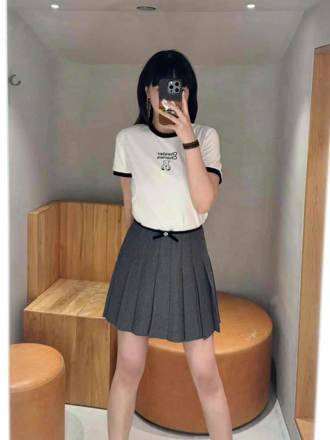 Chân váy ngắn len ghi xám nơ nhỏ