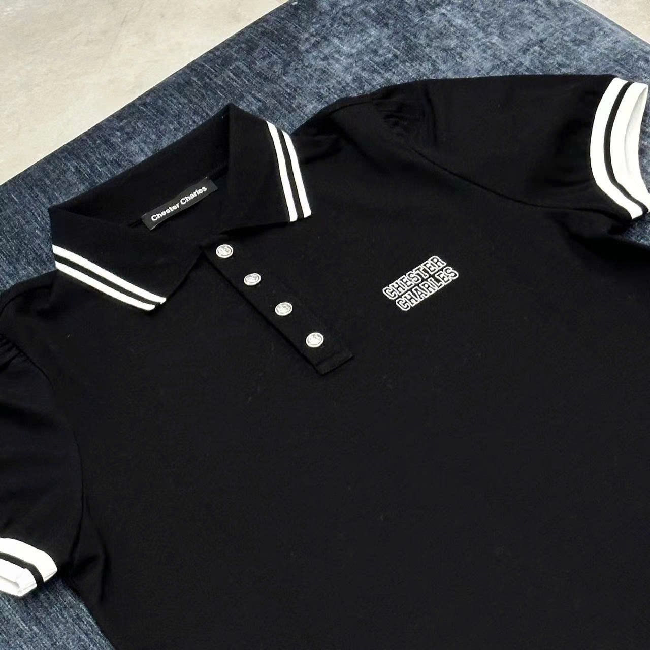 Bộ áo polo cổ viền trắng và chân váy cạp thun C.Charles set