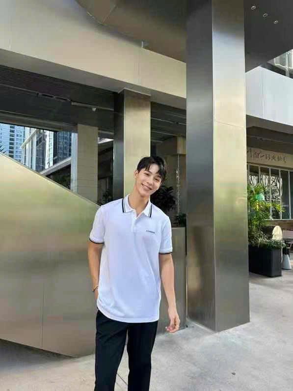 Áo polo trắng - cổ viền đen