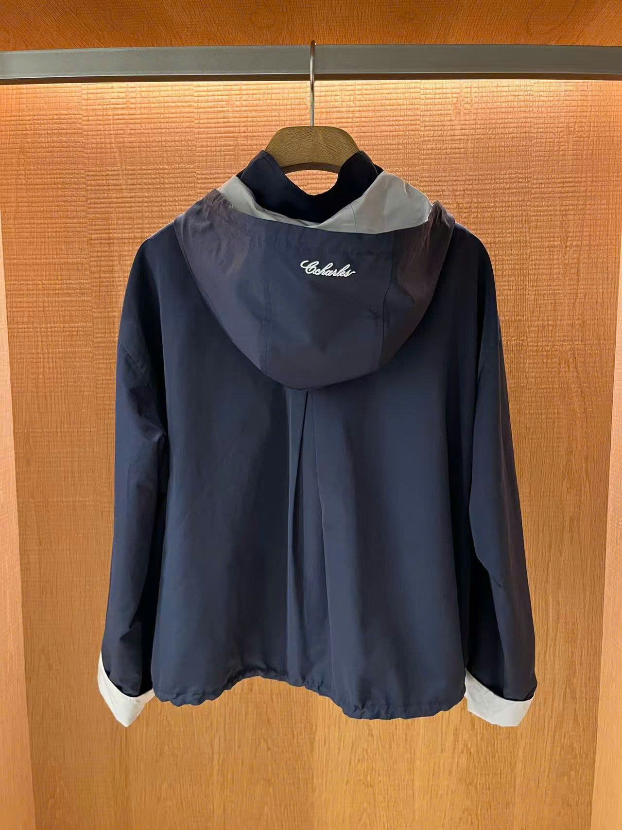 Bộ áo khoác gió và chân váy xếp ly xanh tím than set
