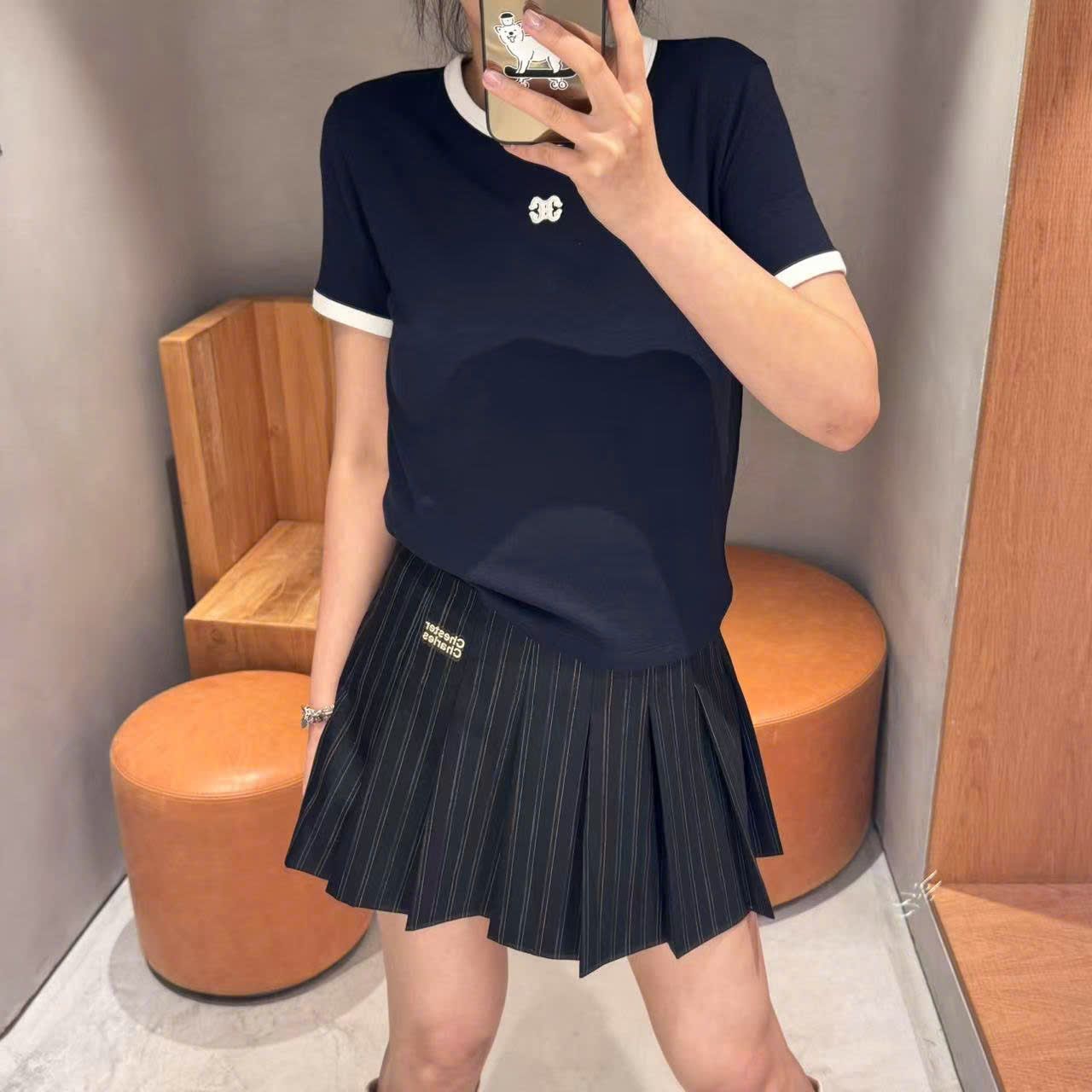 Áo Navy đậm- viền trắng, logo CC nhỏ ngực