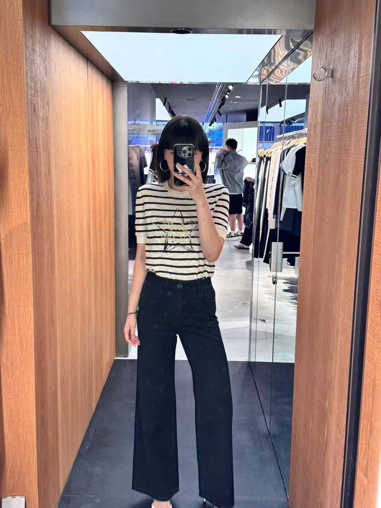 Quần jean đen hoa trà