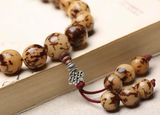 CHUỖI VÒNG TAY HẠT PHẬT BỒ ĐỀ Chất liệu: rễ bồ đề Số lượng hạt: 108 viên