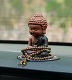 Tượng Phật Thiền Như Lai Chất liệu: Gốm đất sét tím Ứng dụng: Đồ trang trí xe hơi, bàn học Kích thước: 7x6x12 cm