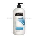 Dầu Xả TRESemmé Smooth Silky Touchable Softness 1150ml