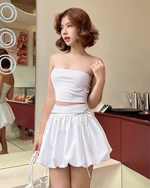 Chân váy ngắn tùng bí thắt nơ