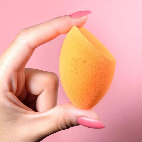  Set 2 Bông Mút Trang Điểm gồm: Mút Tán Kem Nền Real Techniques Miracle Complexion Sponge Và Bông Phủ Phấn Miracle Power Sponge 
