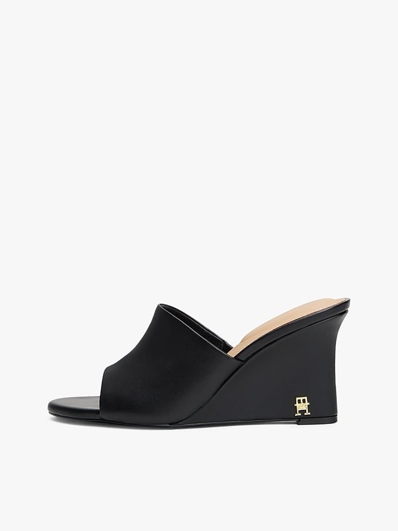 Tommy Hilfiger - Giày đế cao nữ Leather TH Monogram Plaque Wedge Mules