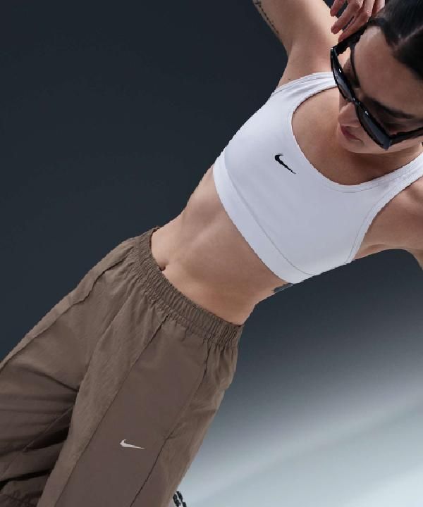 Nike - Quần dài thể thao Nữ Sportswear Everything Woven Mid-Rise Open Hem Pants