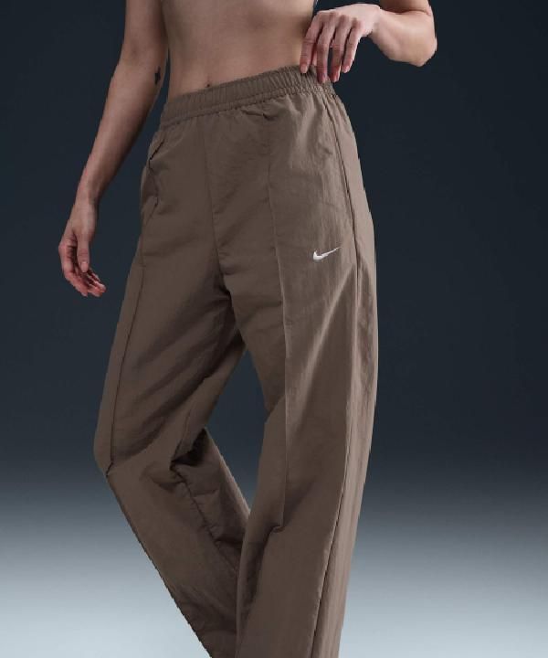 Nike - Quần dài thể thao Nữ Sportswear Everything Woven Mid-Rise Open Hem Pants