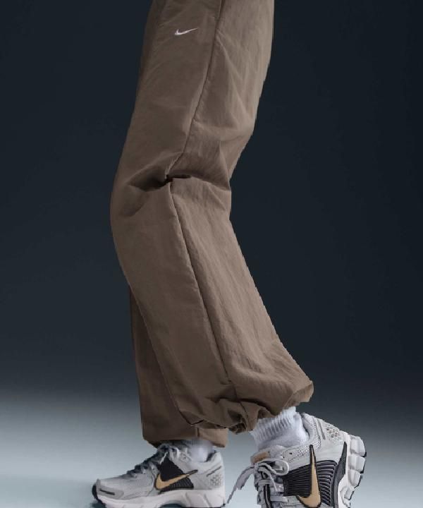 Nike - Quần dài thể thao Nữ Sportswear Everything Woven Mid-Rise Open Hem Pants