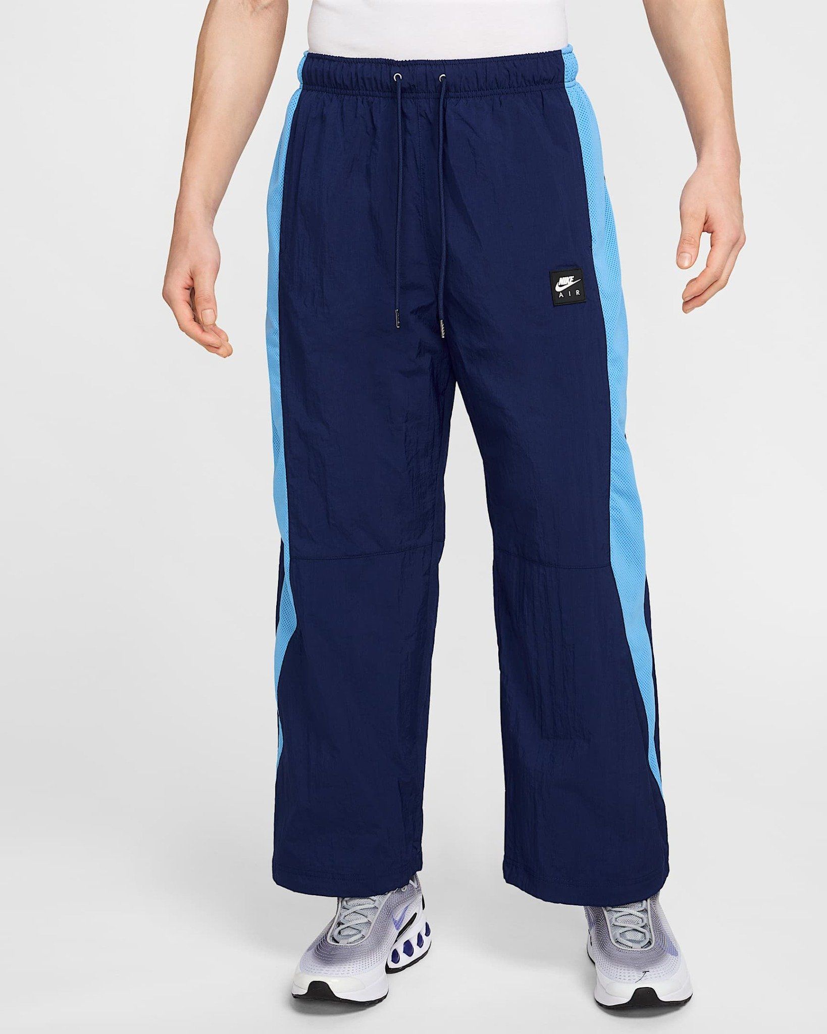 Nike - Quần dài thể thao Nam Air Men's Woven Pants