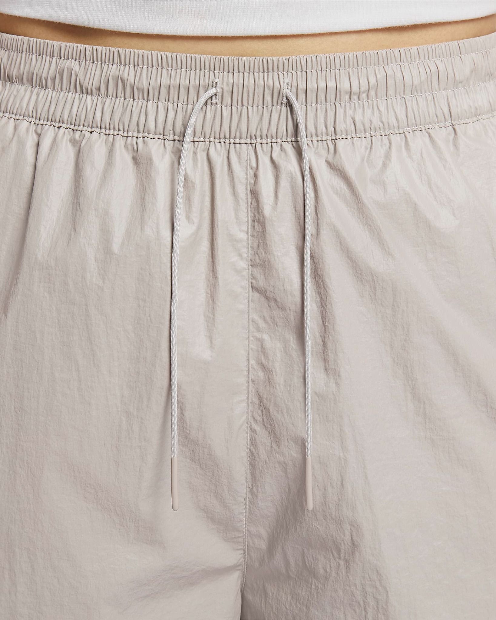 Nike - Quần dài ống rộng Nữ Windrunner Women's Woven High-Waisted Open-Hem Trousers