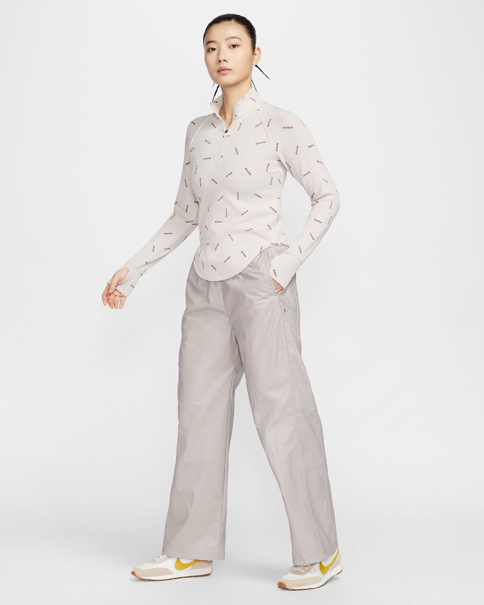 Nike - Quần dài ống rộng Nữ Windrunner Women's Woven High-Waisted Open-Hem Trousers