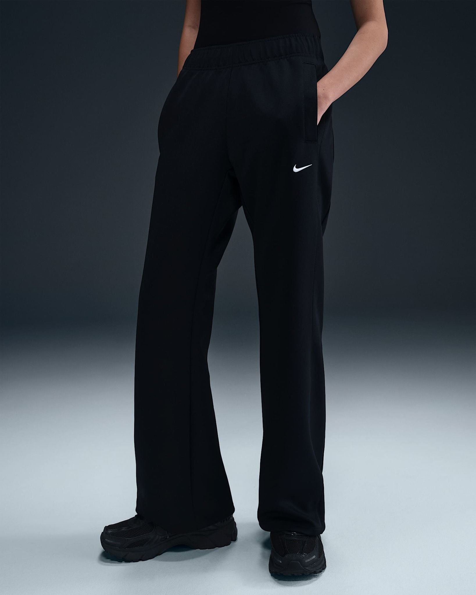 Nike - Quần dài thể thao Nữ Windrunner Women's Slim Mid-Rise Knit Trousers