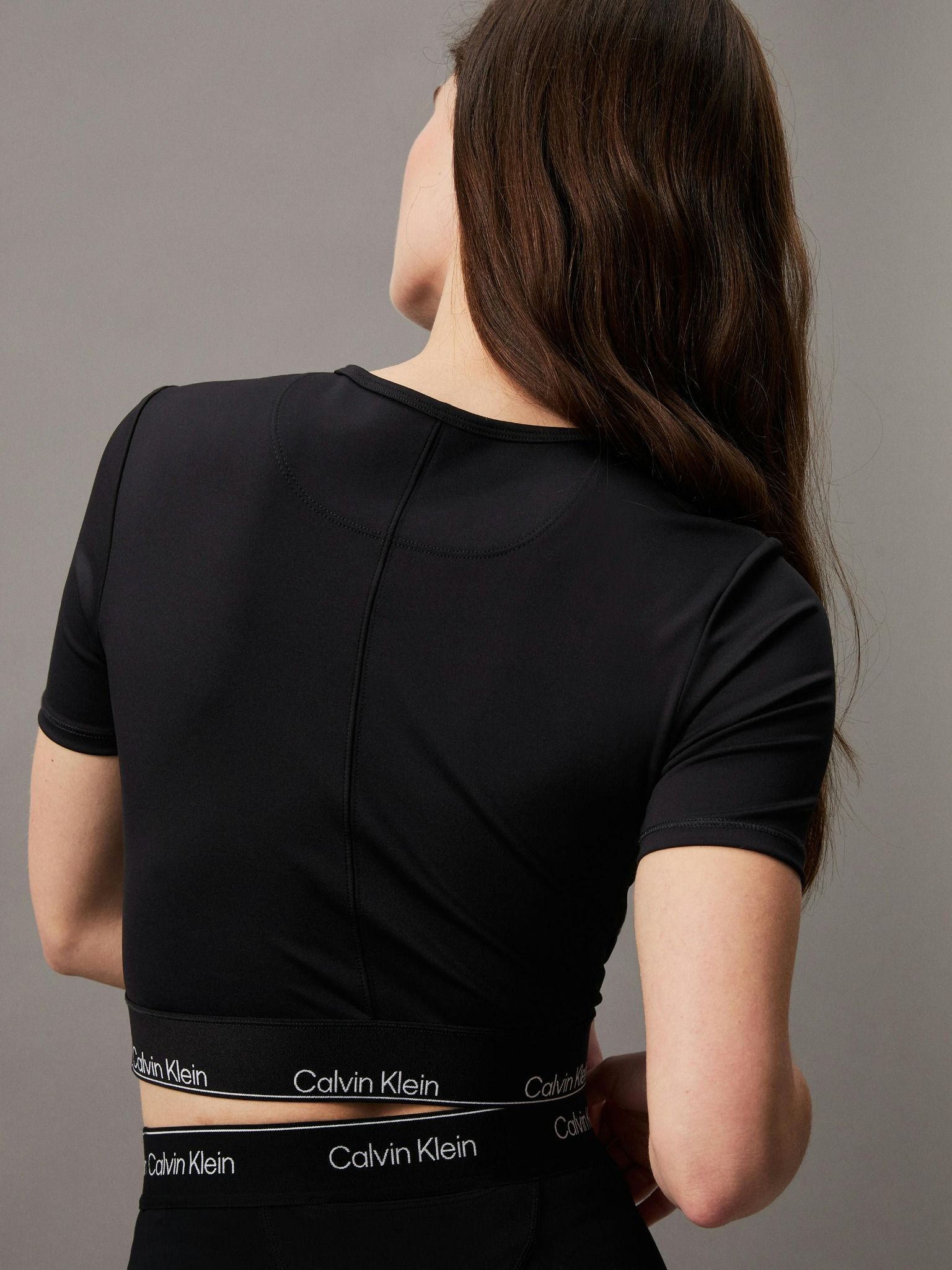 Calvin Klein - Áo tay ngắn thể thao CK nữ Cropped Gym T-Shirt