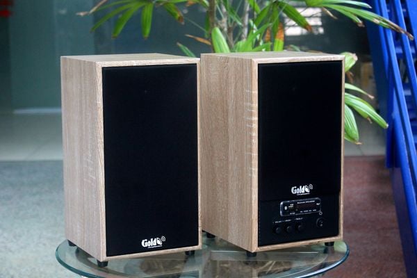 Loa Goldsound G25, công suất 100w, 2 Bass 4 inch, 2 Tress 3 inch, Bluetooth 5.0, cổng rca, khe usb, thiết kế 2 loa thùng gỗ cao 38 cm, rộng 21 cm, sâu 21 cm. Bảo hành 12 tháng