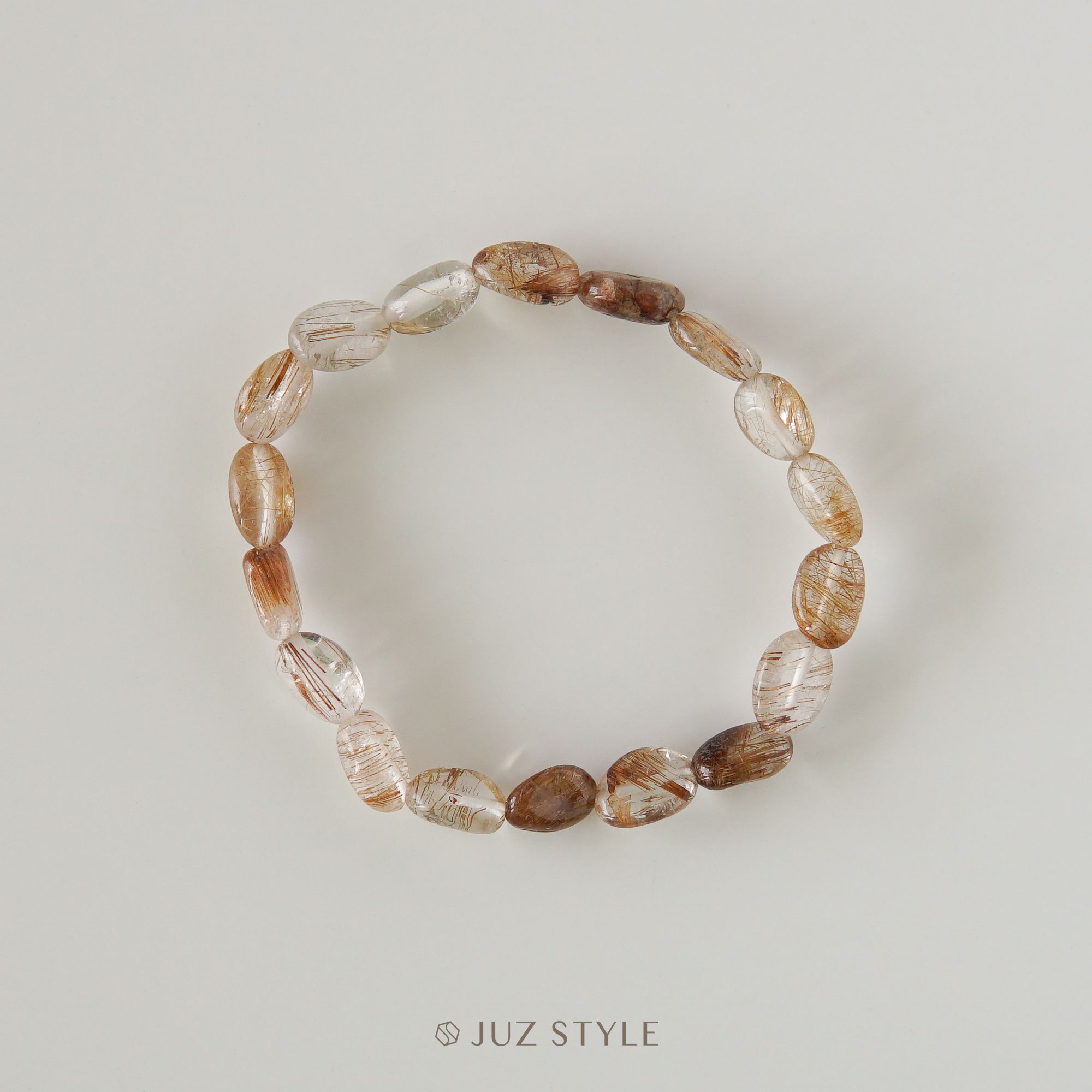  Vòng tay đá Thạch anh tóc đồng (Copper Rutilated quartz) Peble 9x7mm 