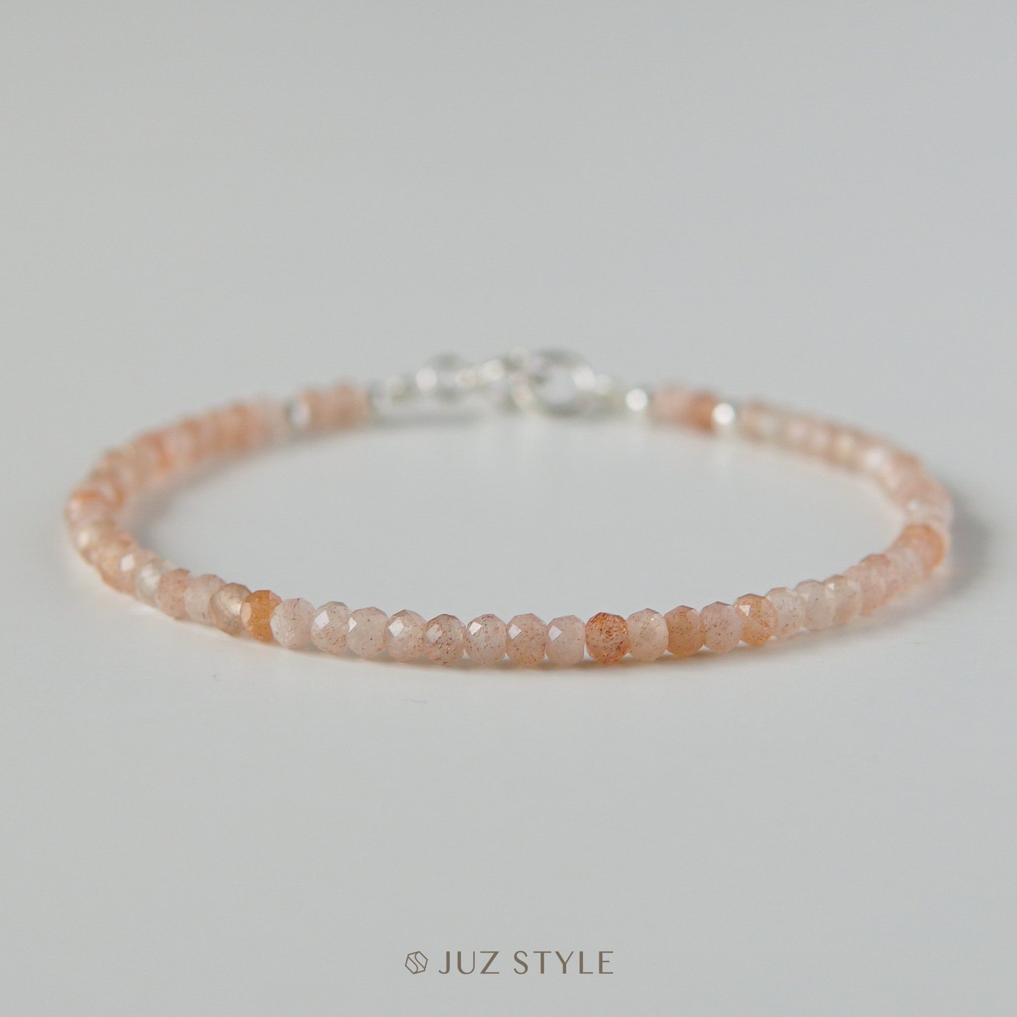  Vòng tay đá Peach moonstone 3x2mm 