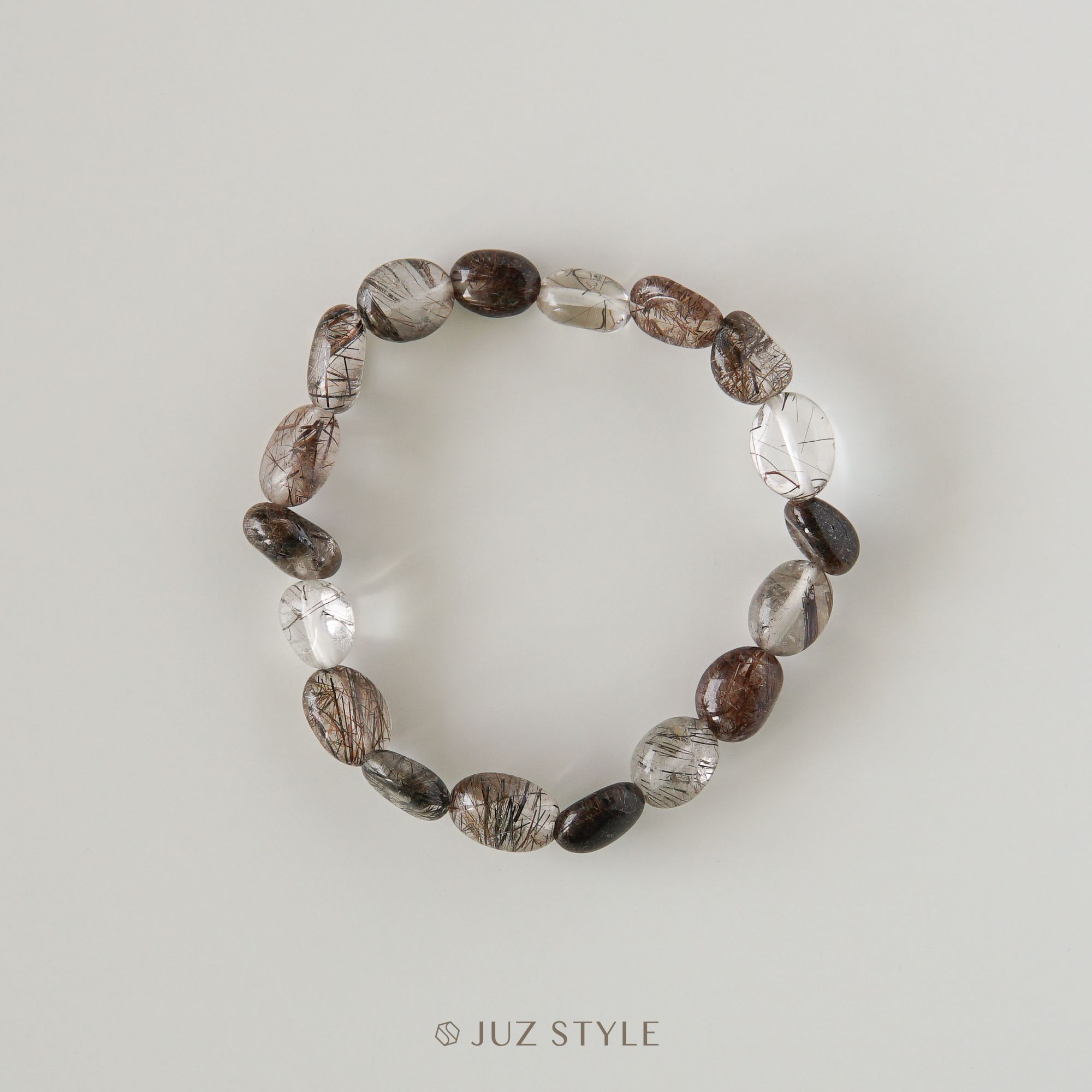  Vòng tay đá thạch anh tóc nâu (Brown Rutilated Quartz) Peble 9x7mm 