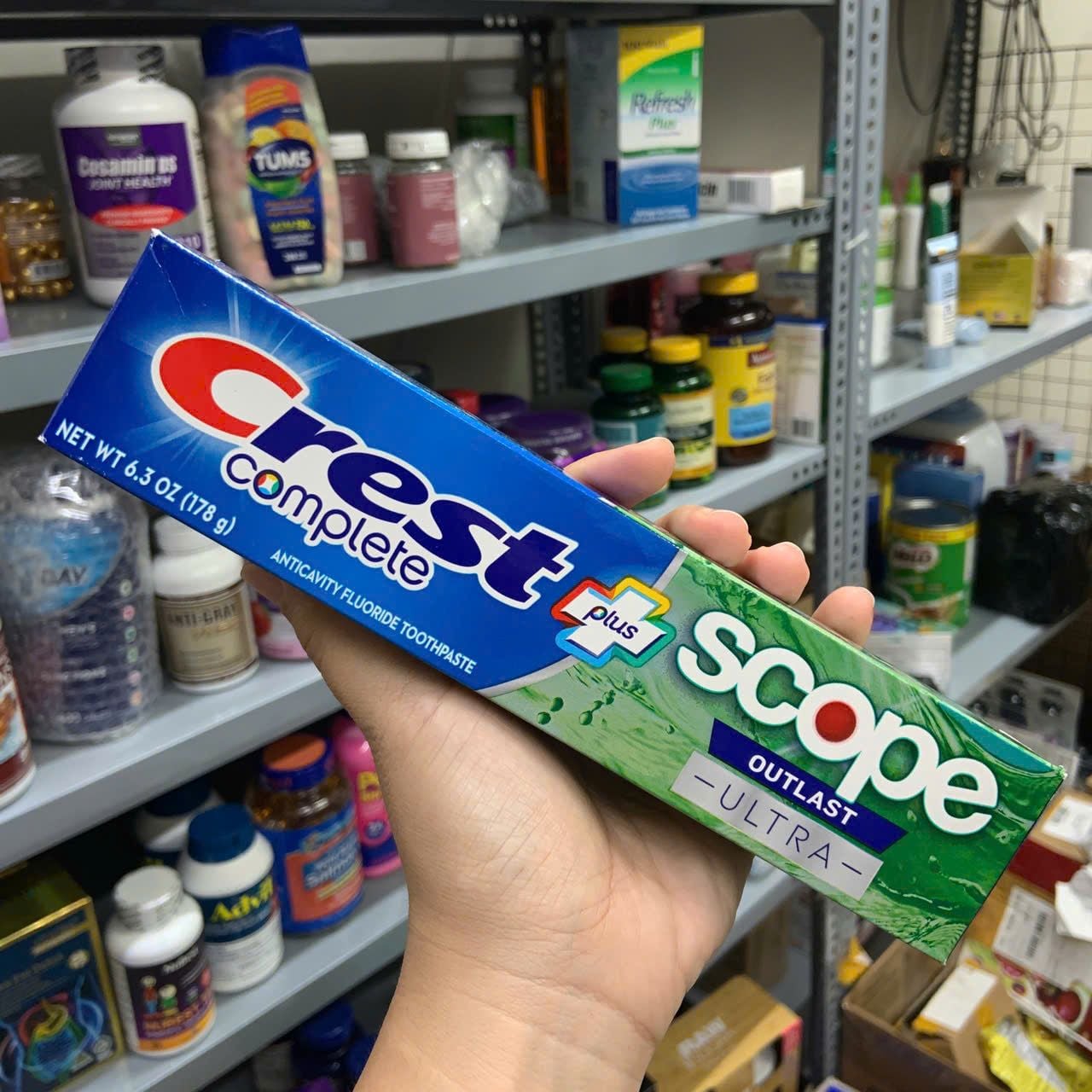 Kem đánh răng Crest Complete Plus Scope