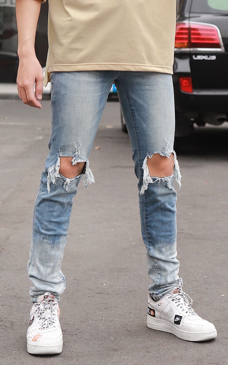 Skinny Jeans With Rips In Mid Wash Blue With Paint Destroy