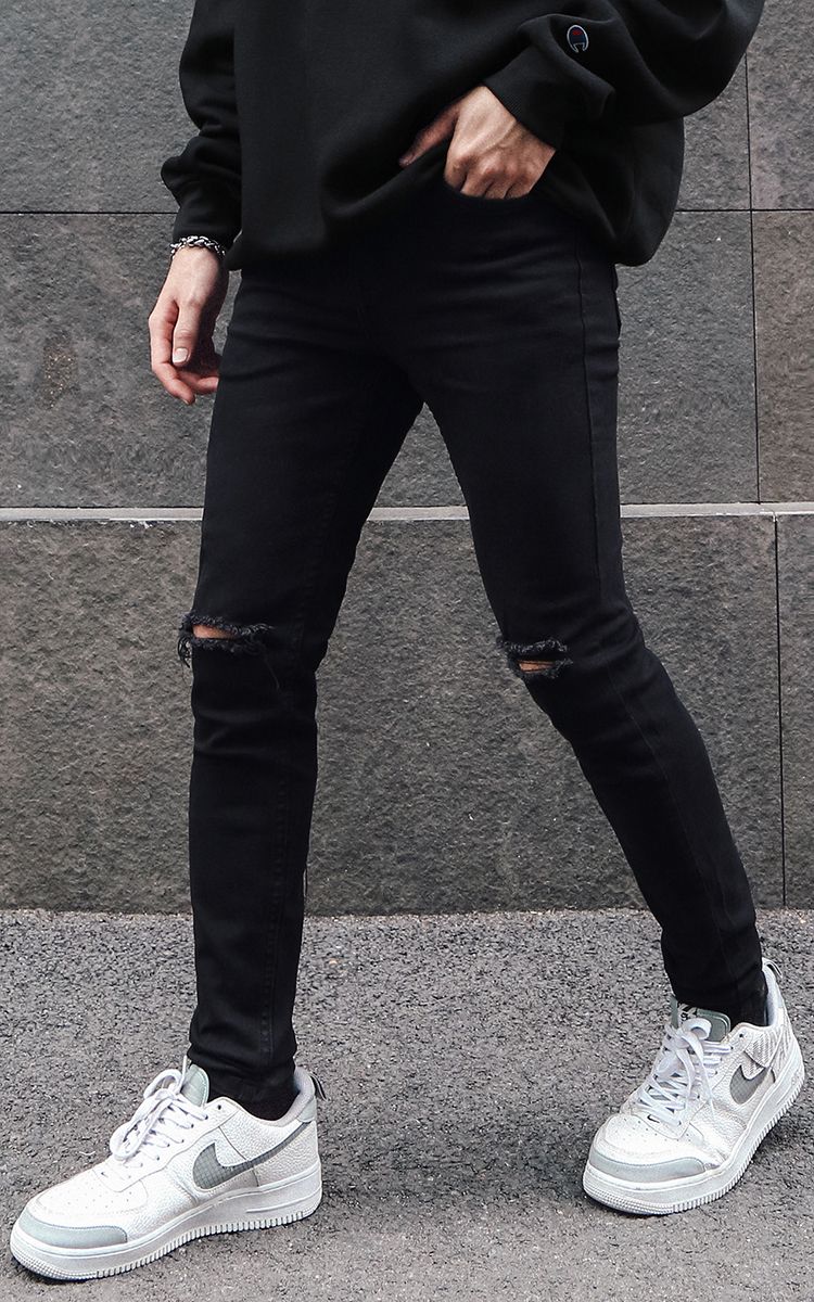 Skinny Jeans With Knee Rips In Black