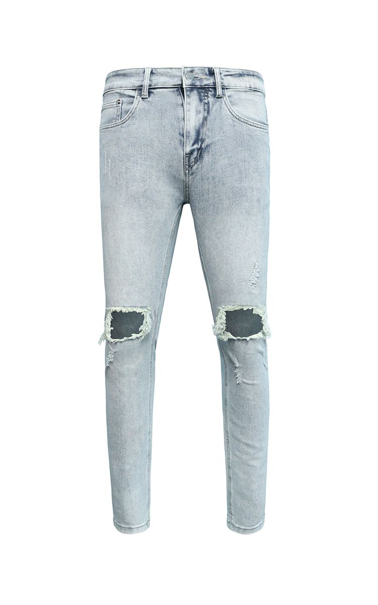 Skinny Jeans With Knee Rips In Mid Wash Blue