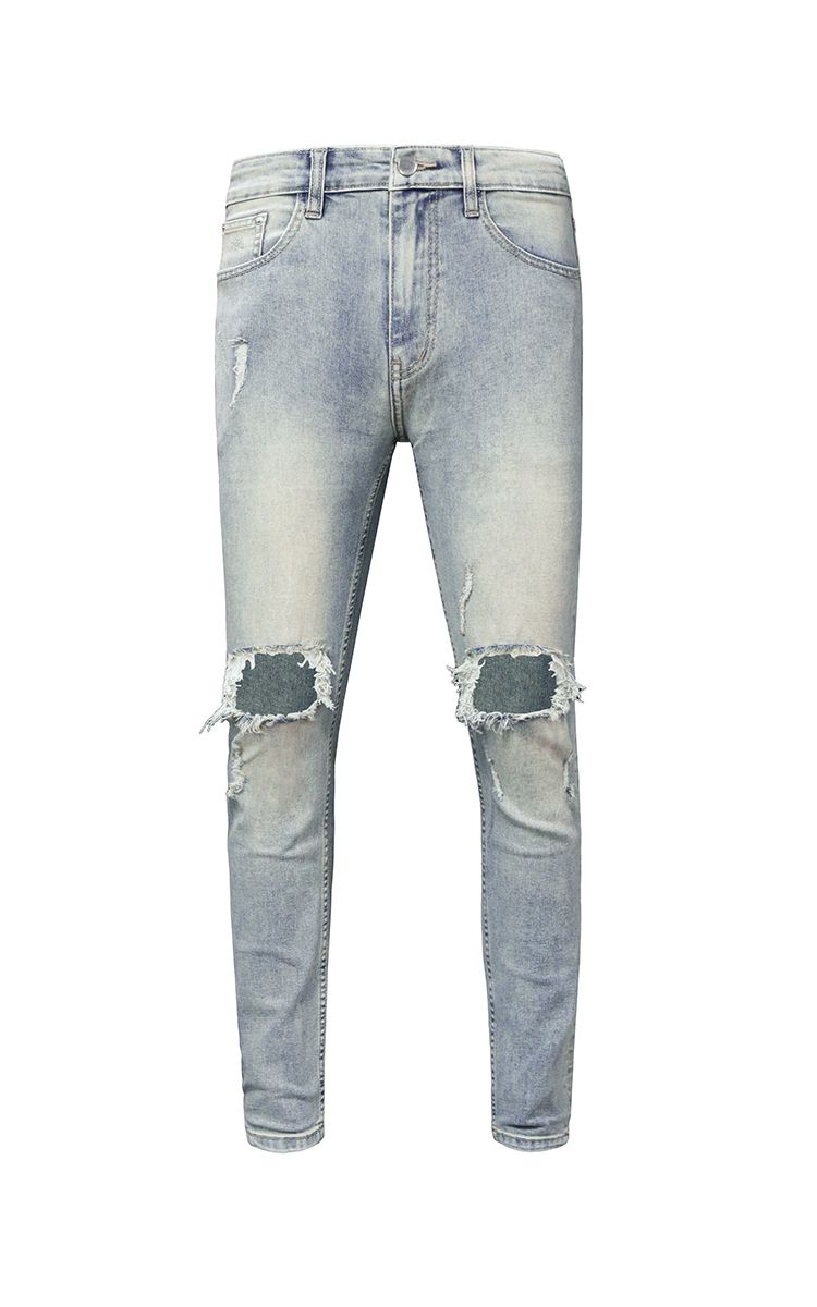 Skinny Jeans With Knee Rips In Mid Wash Blue