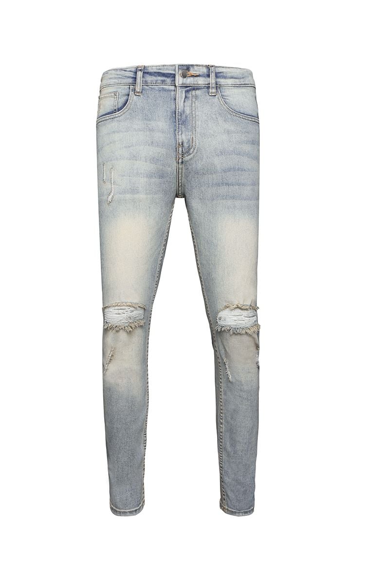 Skinny Jeans With Knee Rips In Blue