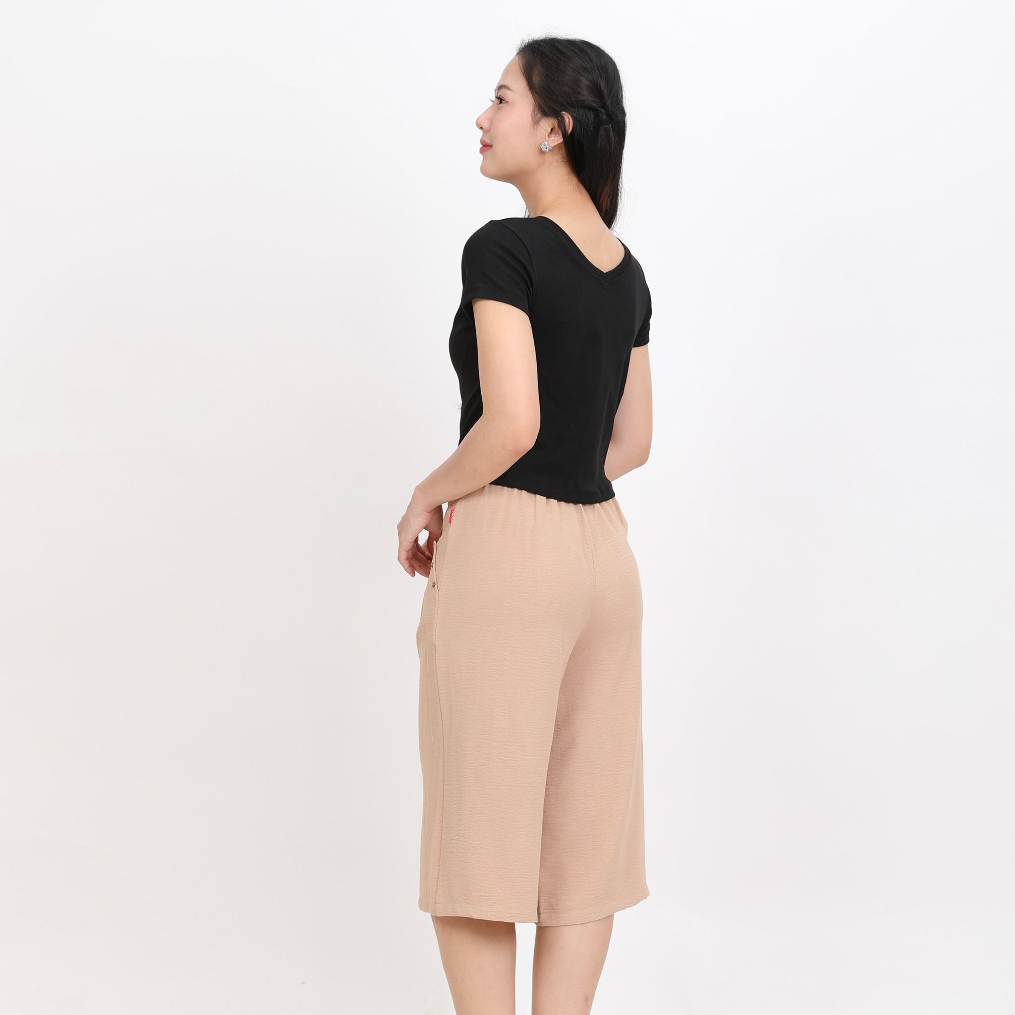 Quần thể thao nữ ống lửng chất đũi 338p 8522