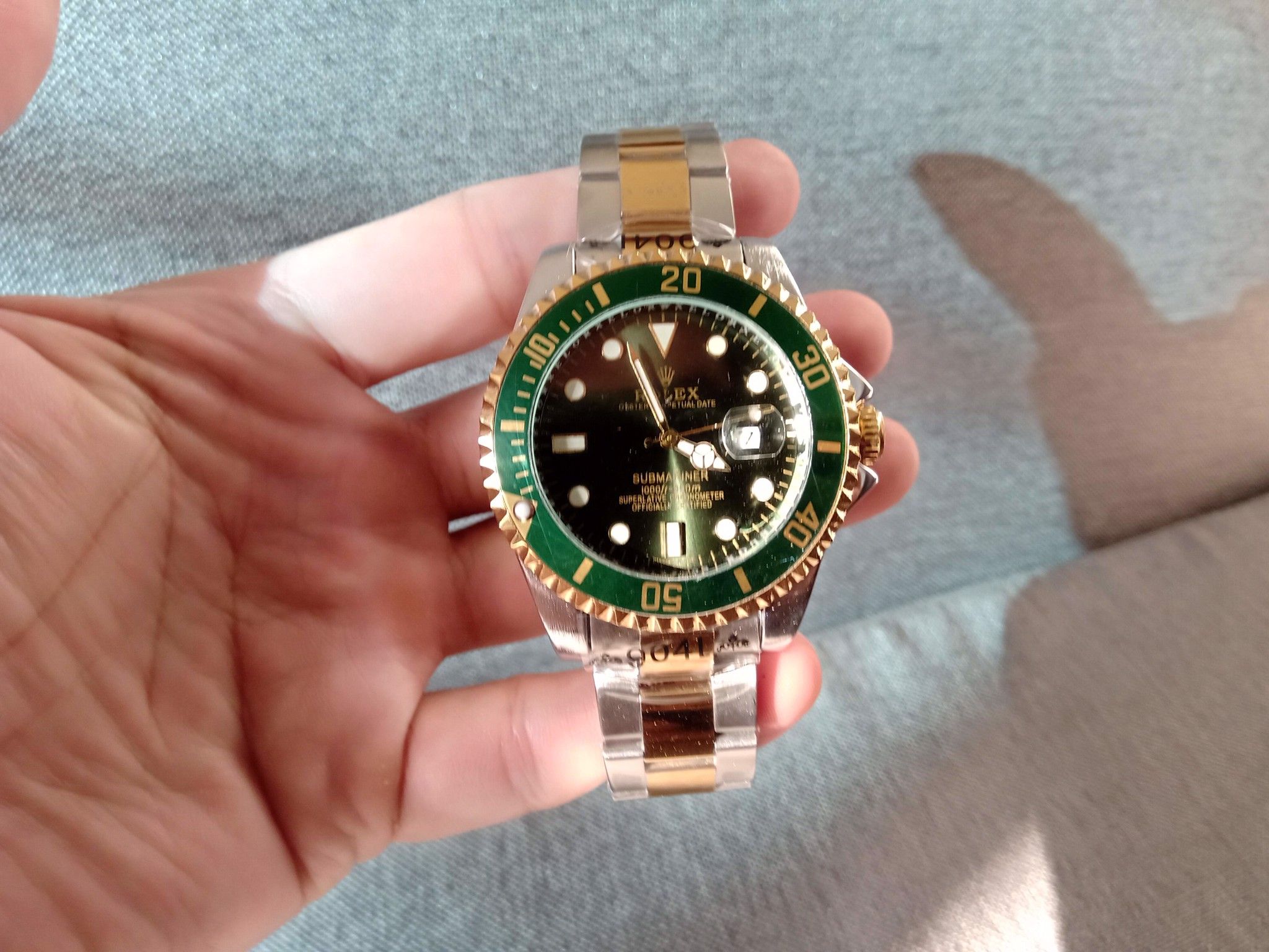 Đồng hồ Rolex nam mặt xanh lá, vòng xoay xanh lá, dây đờ mi, size 42