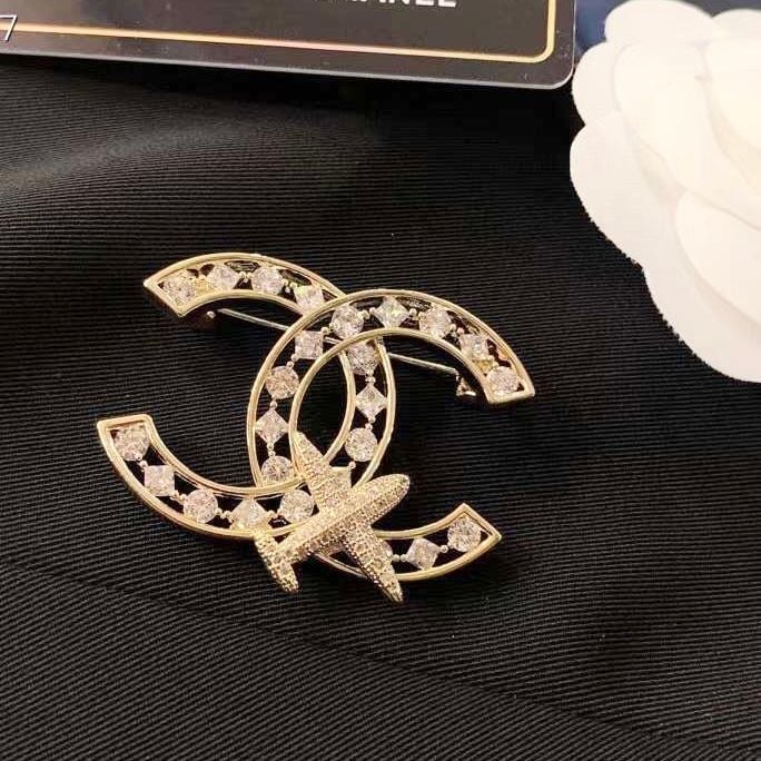  Cài Áo Chanel Máy Bay Màu Vàng Pha Lê Trắng (CP) 