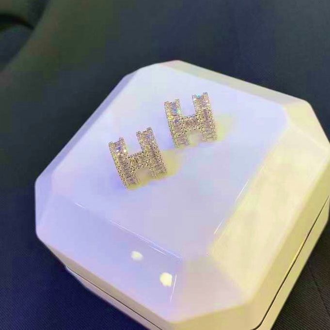  Bông Tai Hermes Màu Vàng Pha Lê Trắng (AH) 