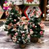 Cây thông trang trí Noel nhỏ gắn nơ, trái thông, trái châu