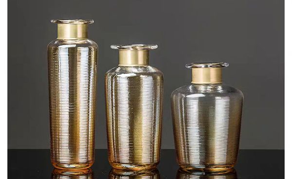 Bình thủy tinh champagne viền kim loại